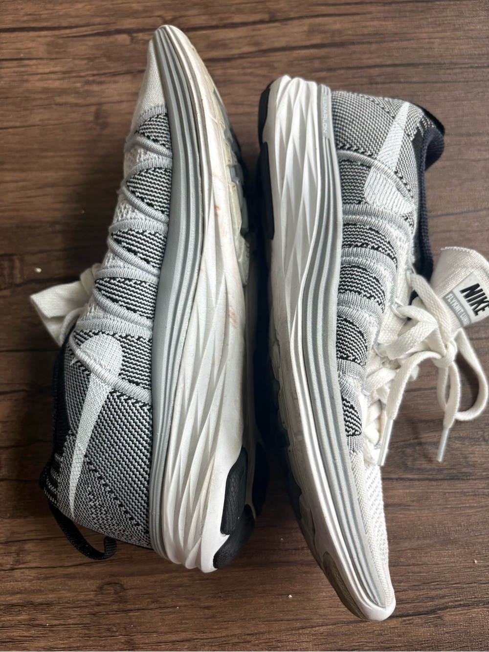 Nike Women’s White and Black Flyknit Sneakers - Picture 3 of 7